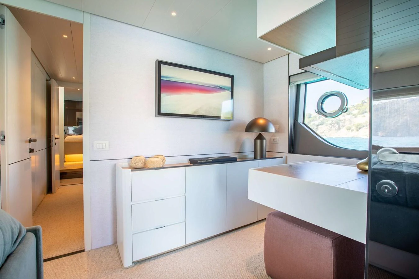 a kitchen with a large window aboard 2020 BLUEGAME BGX70 #02 Yacht for Sale
