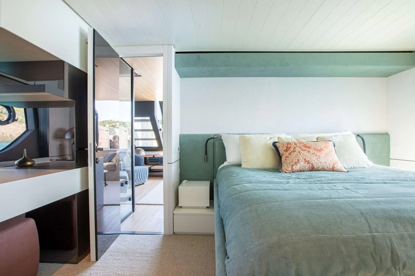 a bedroom with a bed and a mirror aboard 2020 BLUEGAME BGX70 #02 Yacht for Sale