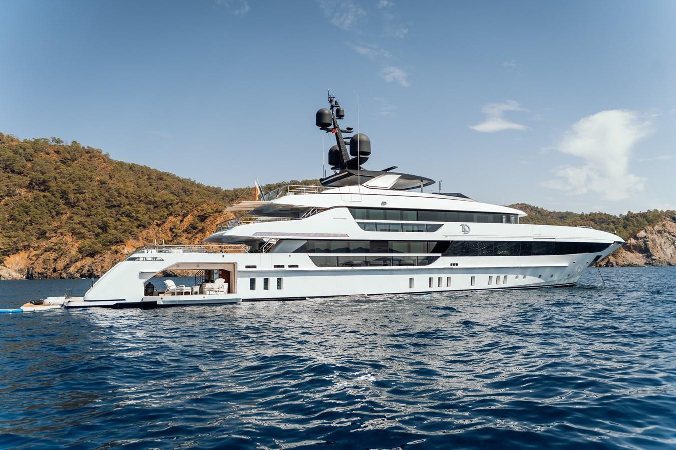 a white yacht on the water aboard ALULIM Yacht for Sale