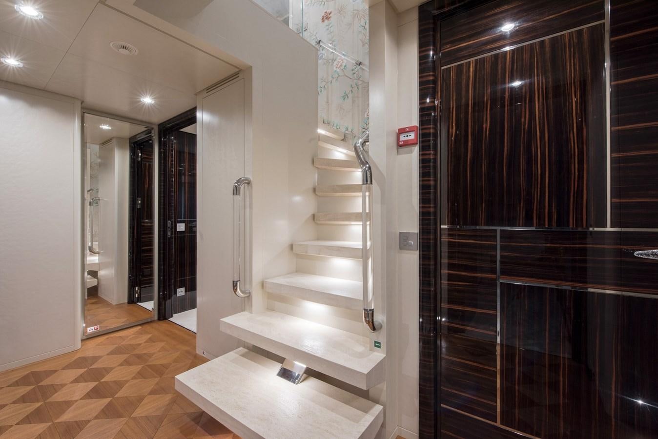 a staircase in a building aboard ALULIM Yacht for Sale