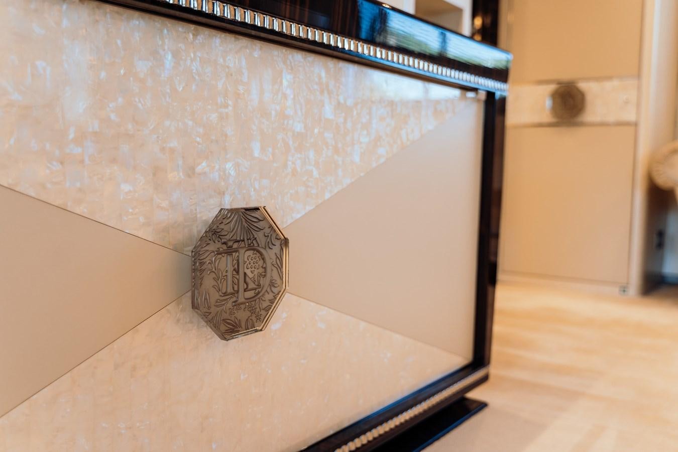 a stone on a white surface aboard ALULIM Yacht for Sale