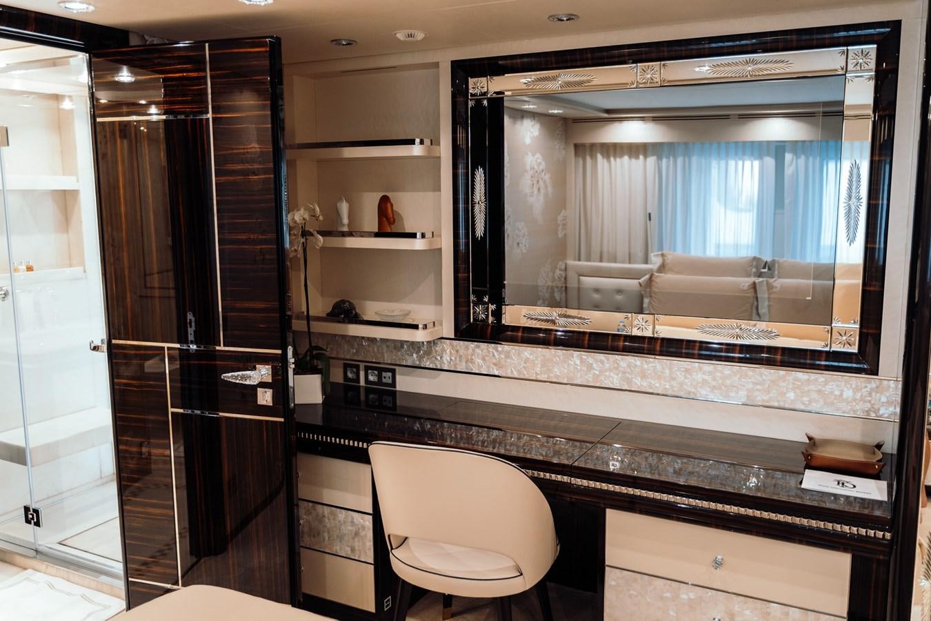 a bathroom with a large mirror aboard ALULIM Yacht for Sale