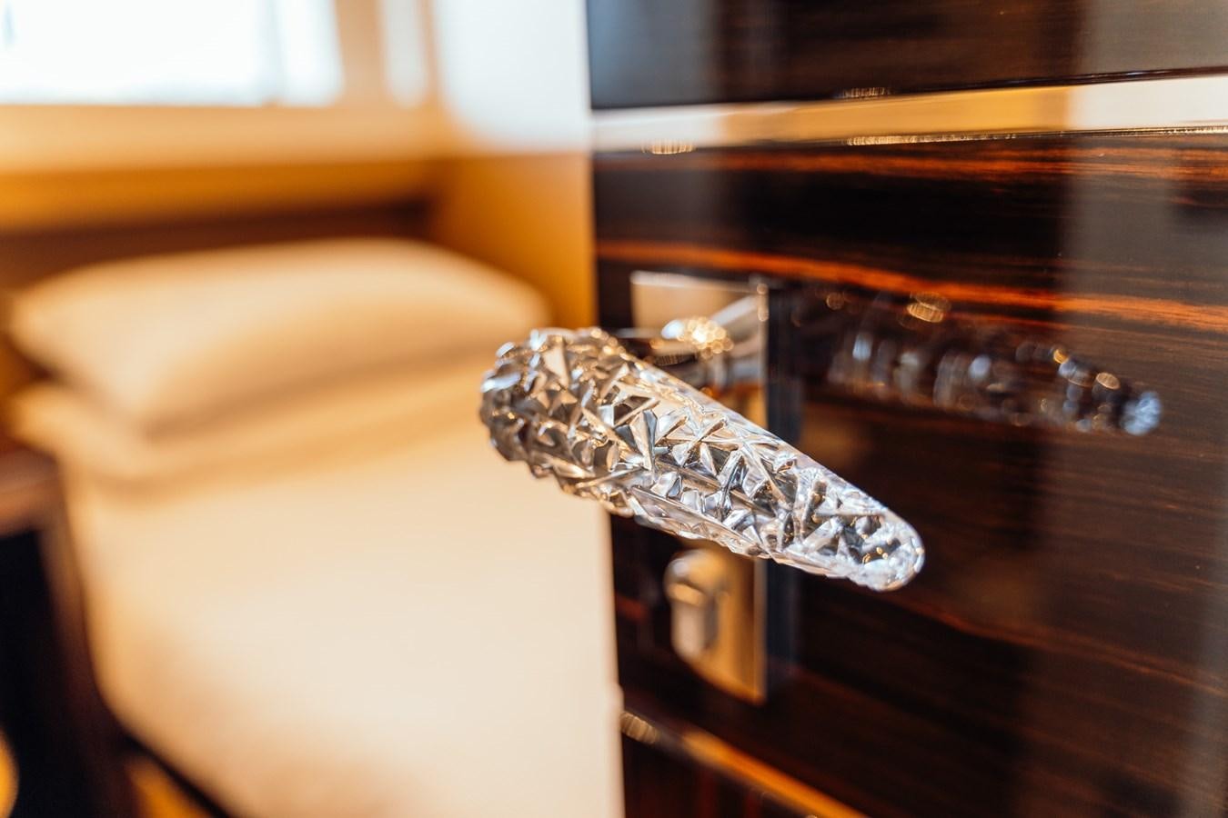 a foil wrapper on a table aboard ALULIM Yacht for Sale