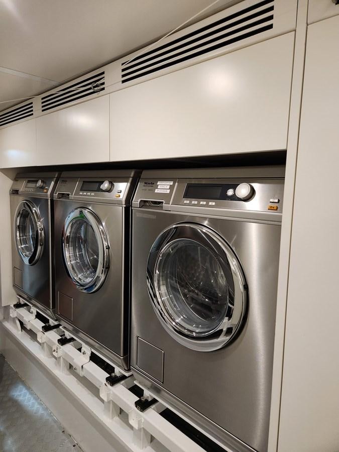 a group of washing machines aboard ALULIM Yacht for Sale