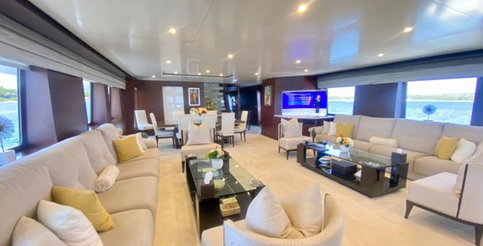 a living room with a large window aboard LADY NORA Yacht for Sale