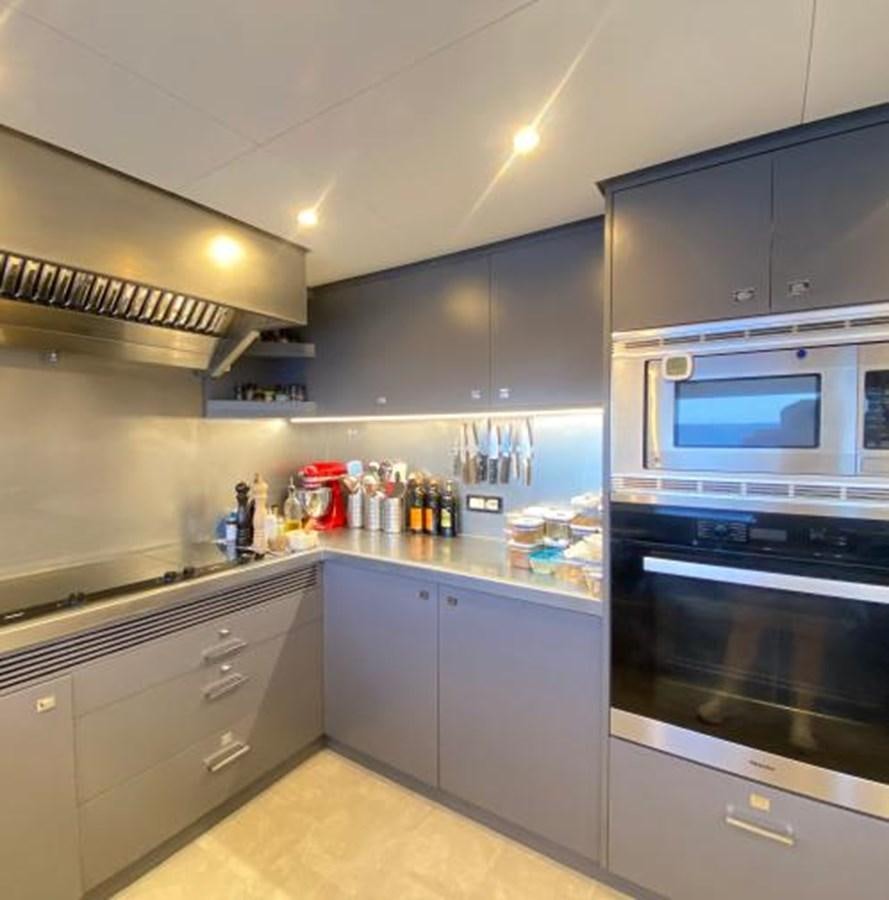 a kitchen with a large oven aboard LADY NORA Yacht for Sale