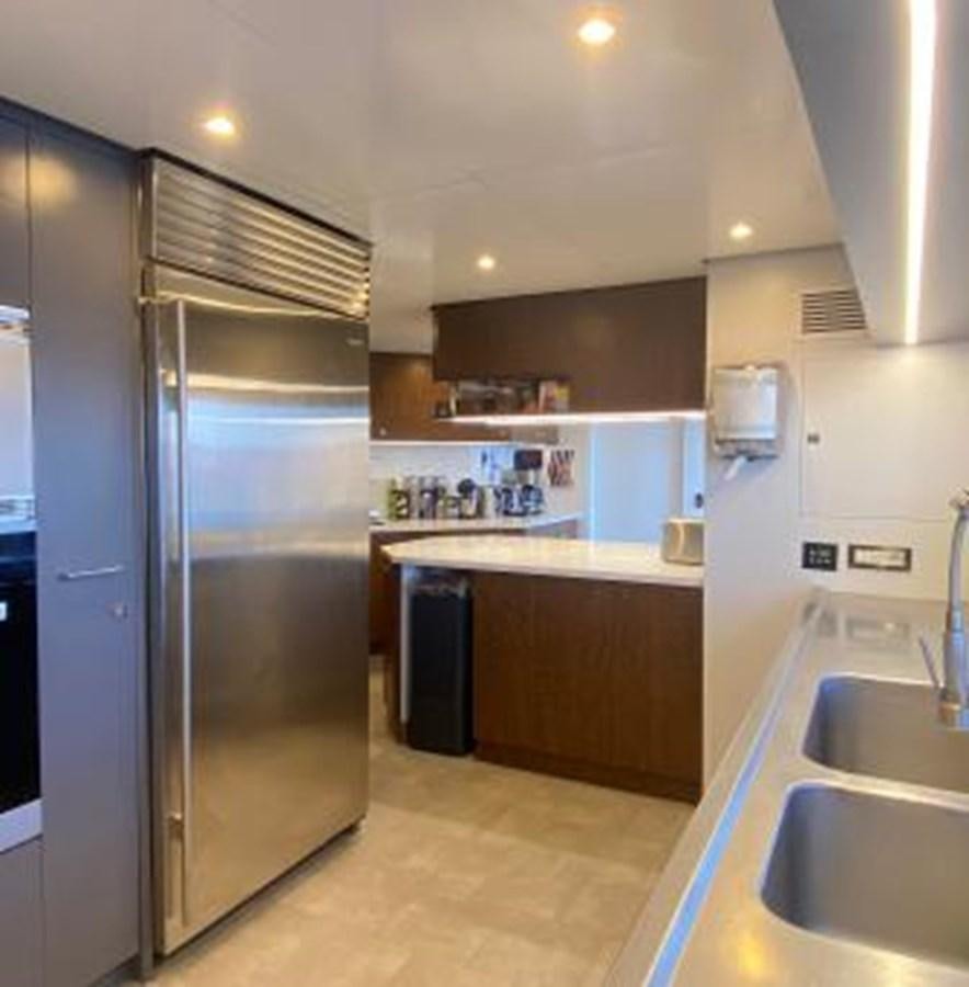 a kitchen with stainless steel appliances aboard LADY NORA Yacht for Sale