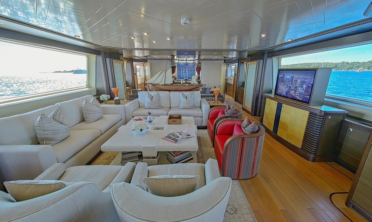 a living room with a large window aboard AD LIB Yacht for Sale