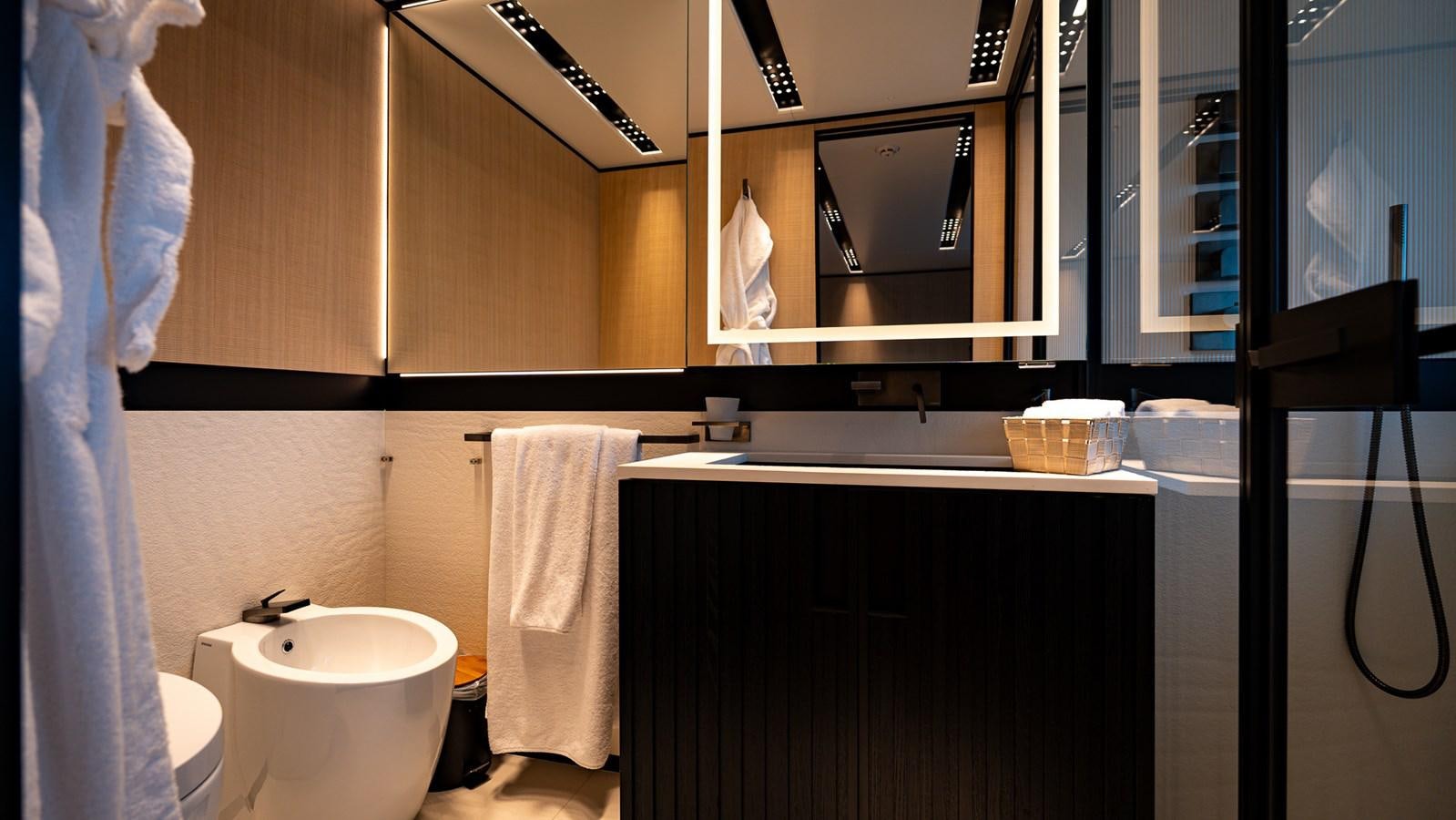 a bathroom with a towel over the sink aboard LASTOCHKA Yacht for Sale