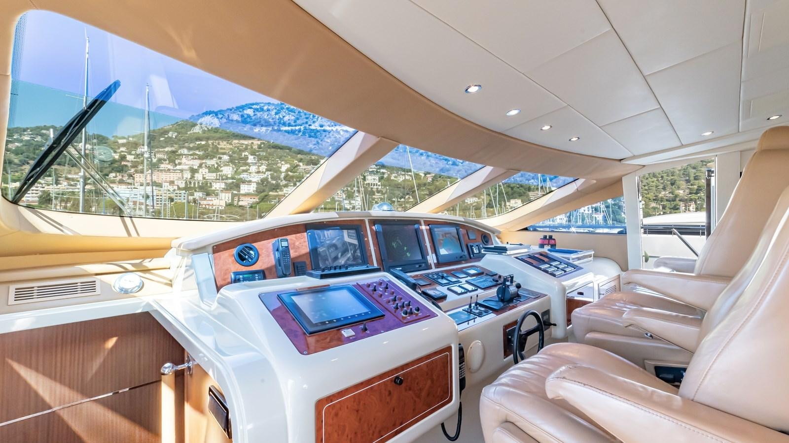 inside of a white car aboard POPEYE Yacht for Sale