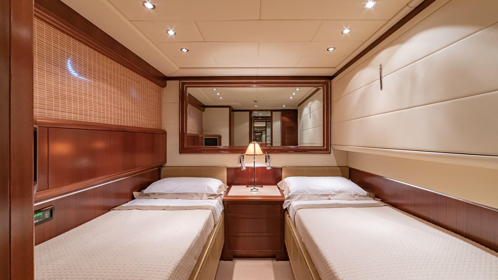 a room with two beds aboard POPEYE Yacht for Sale