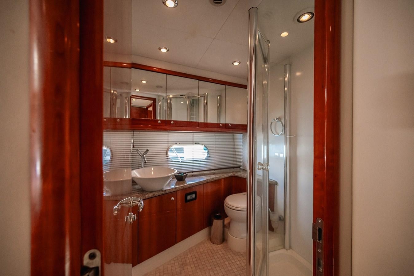 a bathroom with a sink and a toilet aboard BAR.CO Yacht for Sale