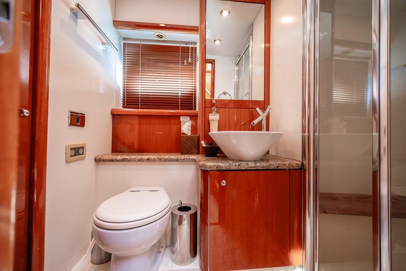 a bathroom with a sink toilet and a shower unit aboard BAR.CO Yacht for Sale