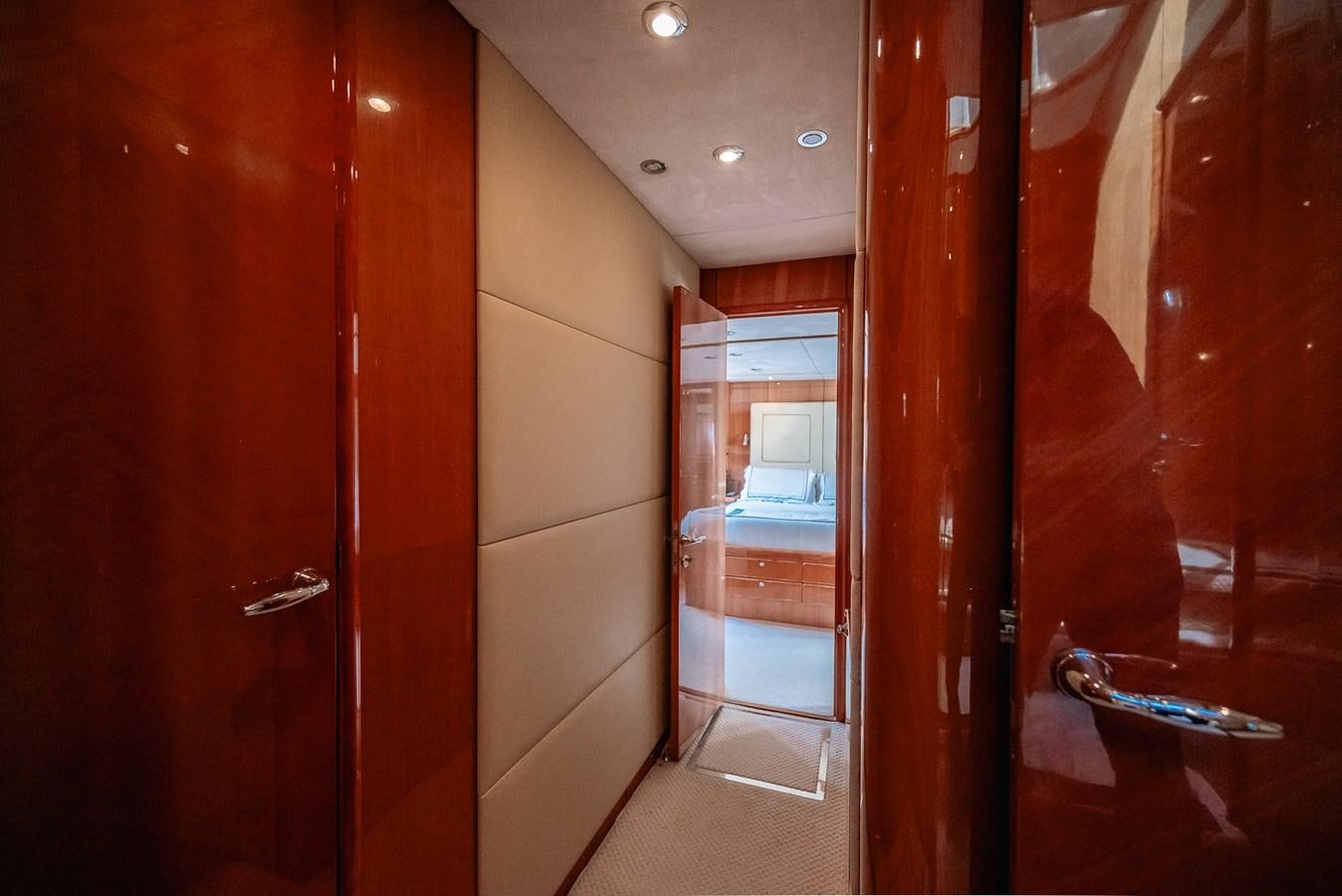 a bathroom with wooden doors aboard BAR.CO Yacht for Sale