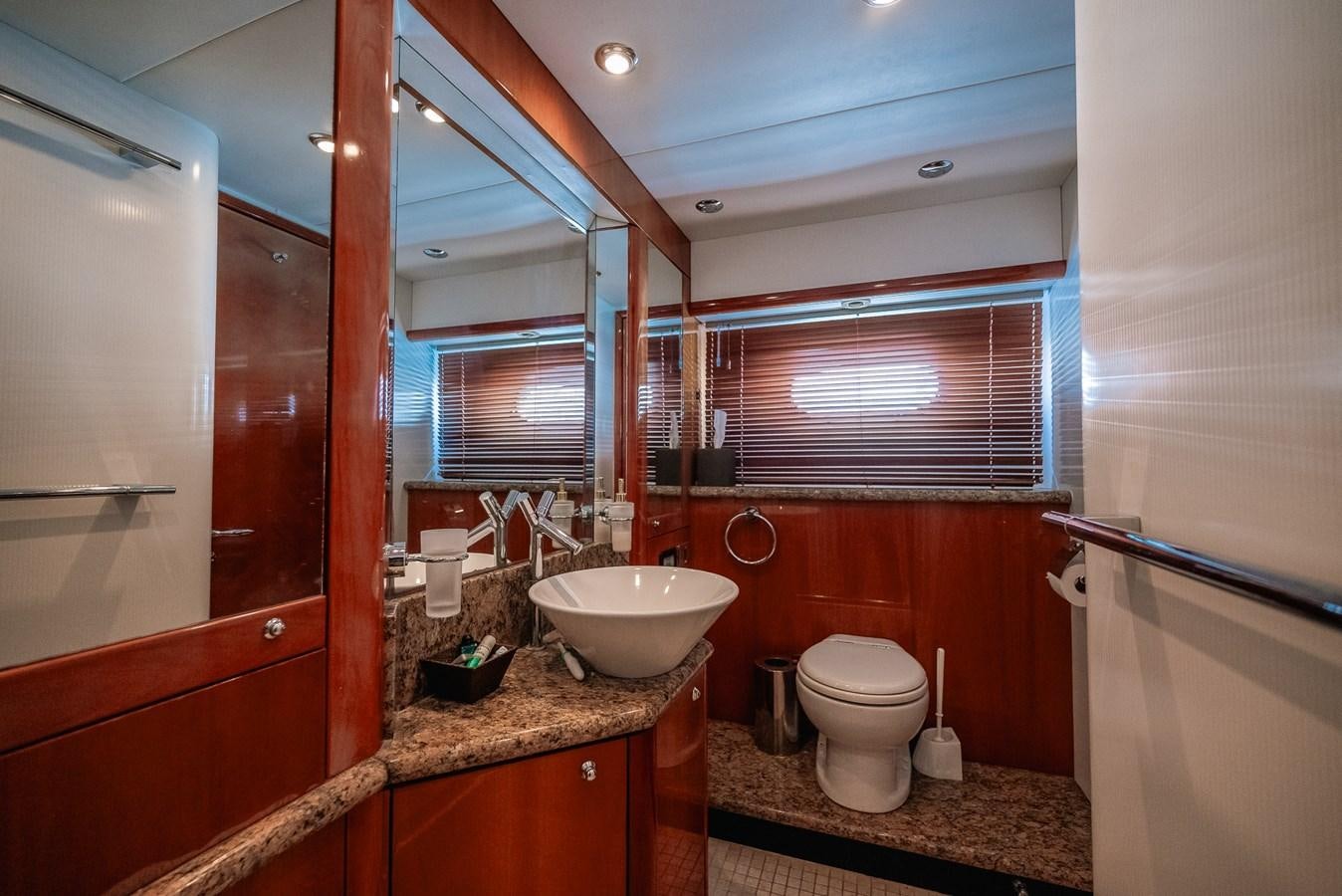 a bathroom with a sink toilet and a bathtub aboard BAR.CO Yacht for Sale