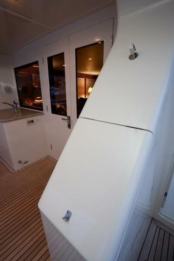 a white refrigerator in a kitchen aboard AL DI LA Yacht for Sale