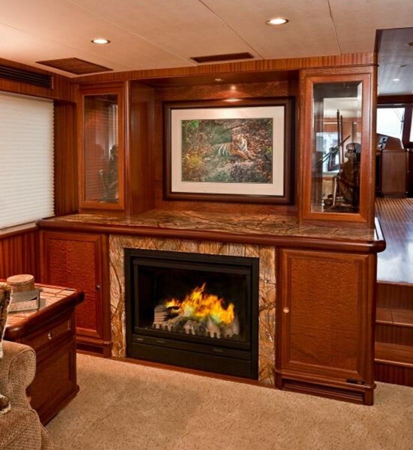a fireplace in a room aboard AL DI LA Yacht for Sale