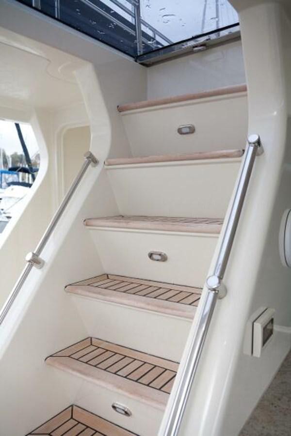 a white cabinet with drawers aboard AL DI LA Yacht for Sale