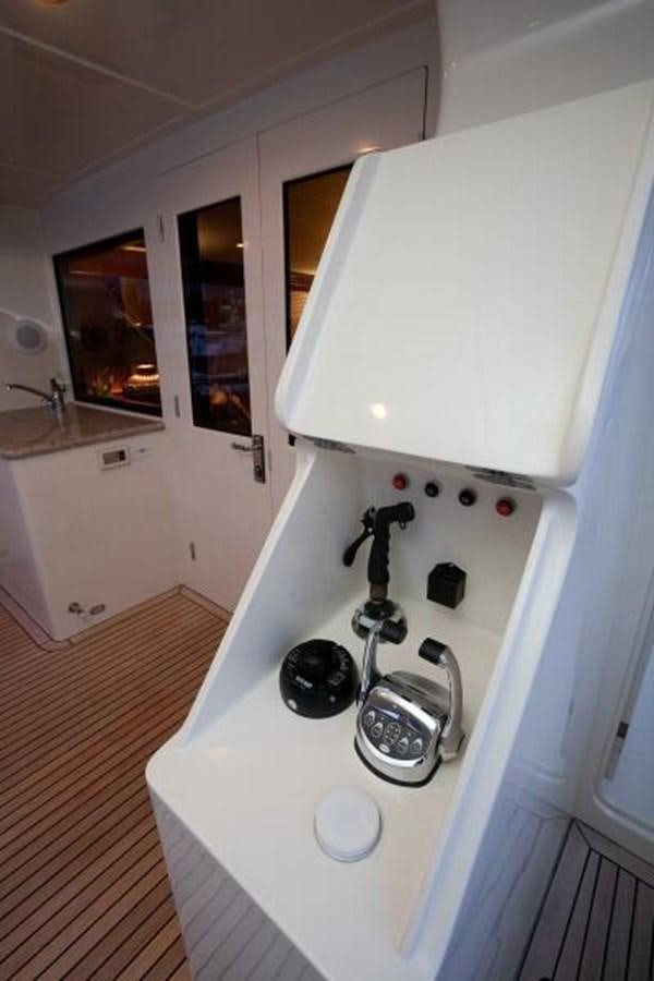 a white cabinet in a kitchen aboard AL DI LA Yacht for Sale
