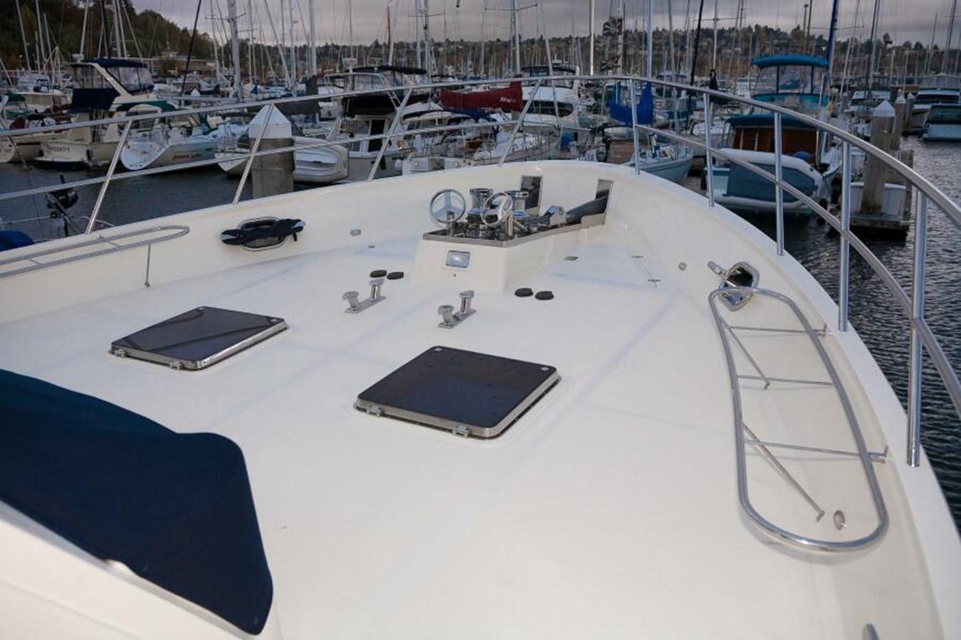 a large white boat with many boats aboard AL DI LA Yacht for Sale