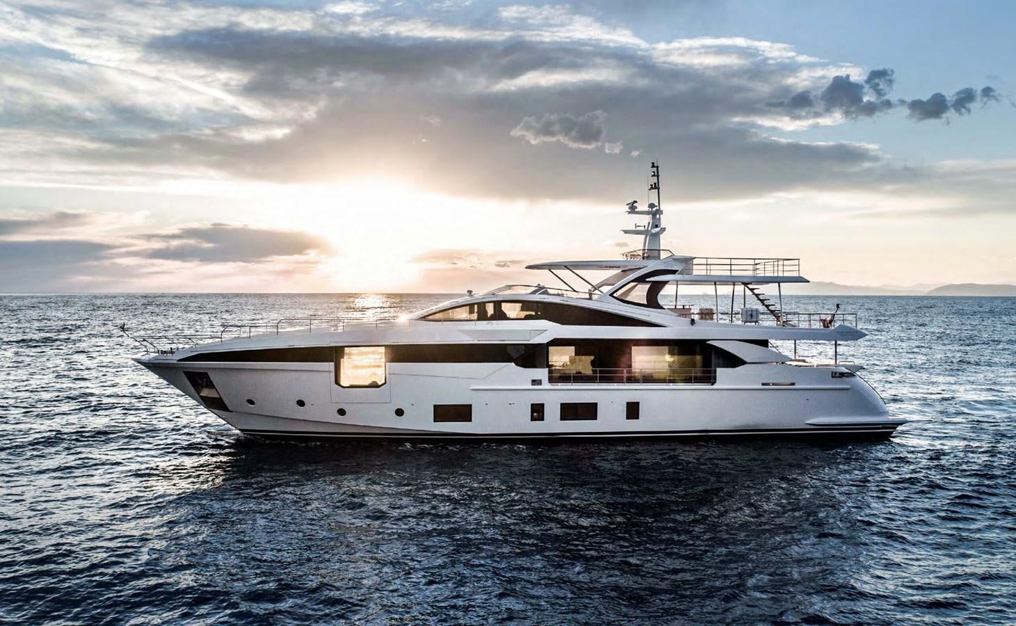 a white yacht in the water aboard 2019 AZIMUT GRANDE 35 M/Y HEED Yacht for Sale