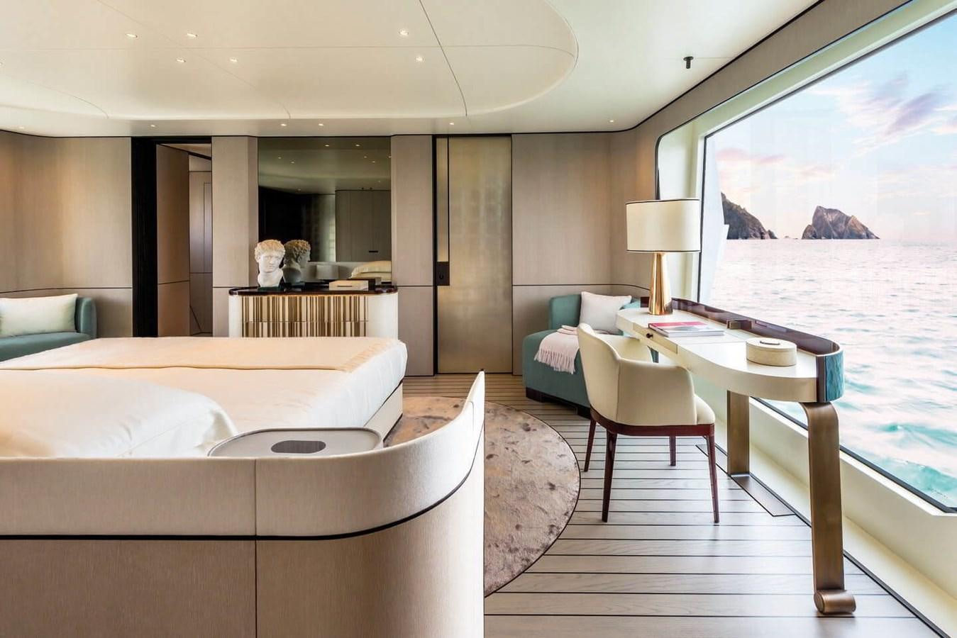 a room with a table chairs and a large window aboard 2019 AZIMUT GRANDE 35 M/Y HEED Yacht for Sale