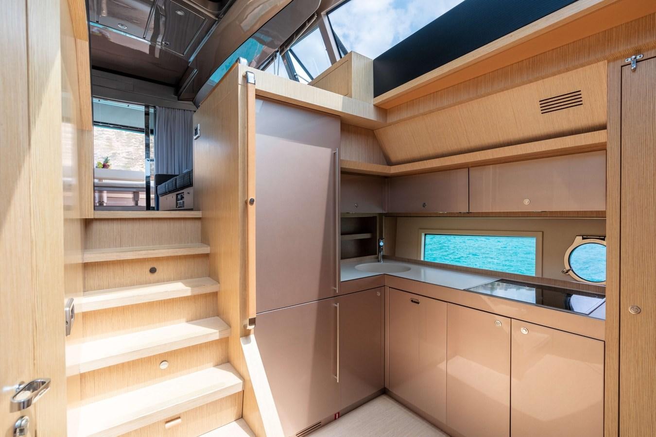 a wooden cabin with a large window aboard 2008 RIVA SUPER EGO 68 Yacht for Sale
