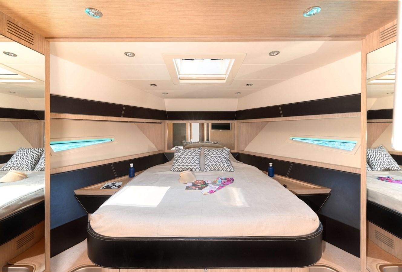 a room with a bed and a desk aboard 2008 RIVA SUPER EGO 68 Yacht for Sale
