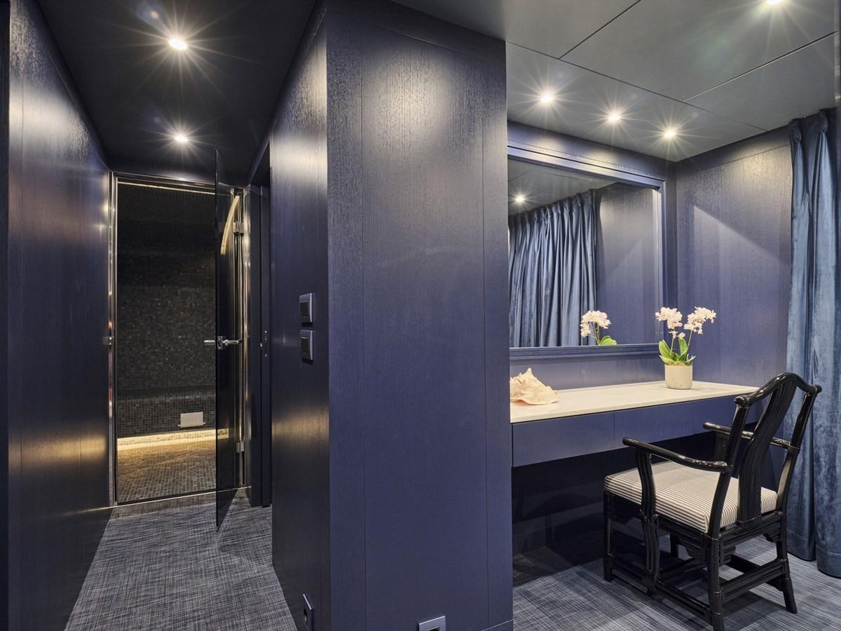 a room with a table and chairs aboard AKULA Yacht for Sale