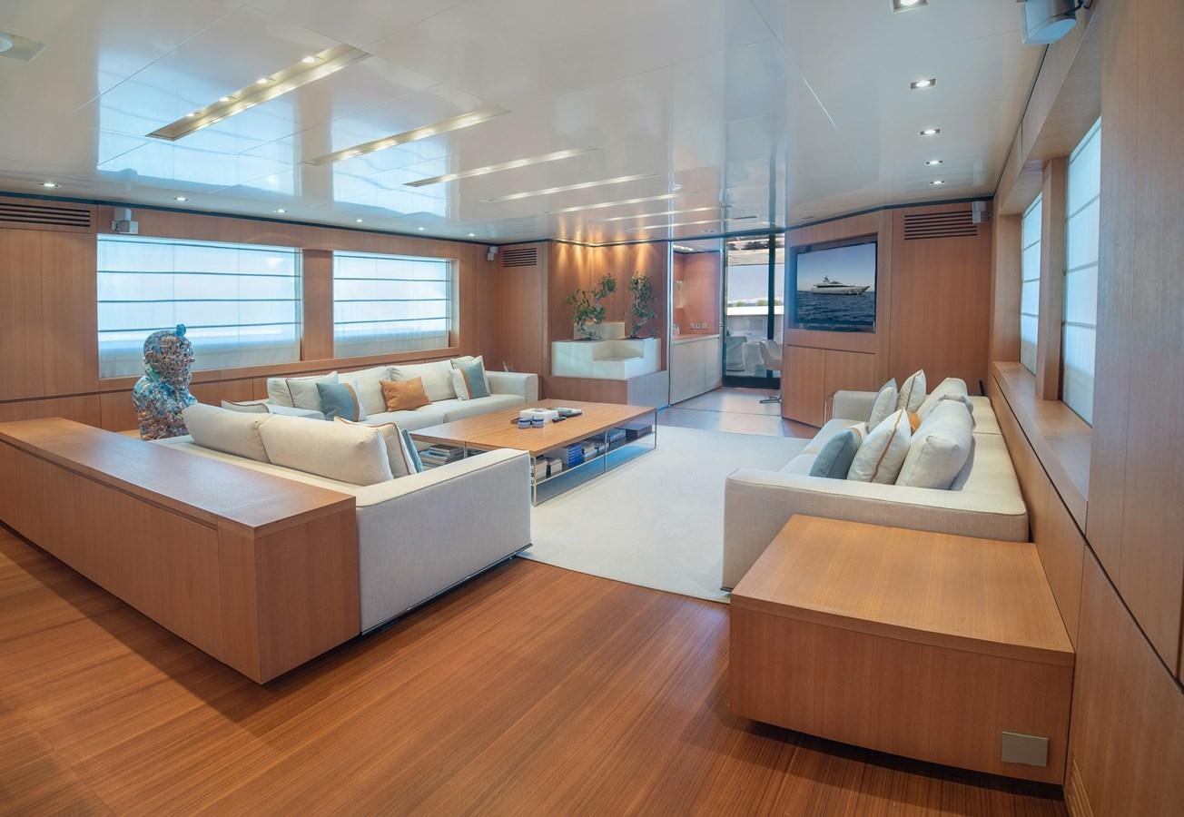 a living room with a large window aboard TIN TIN Yacht for Sale