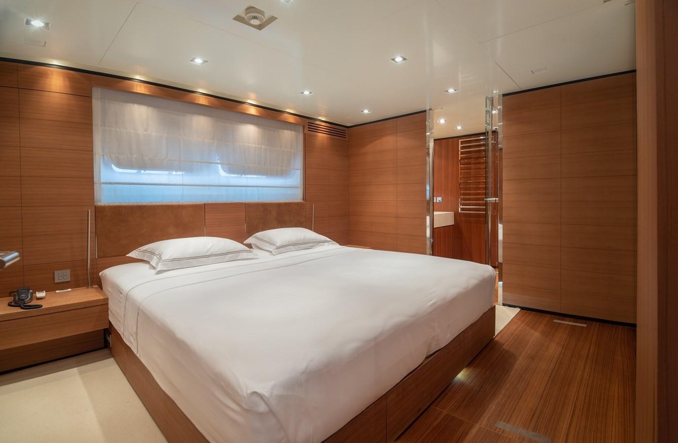 a bed in a room aboard TIN TIN Yacht for Sale