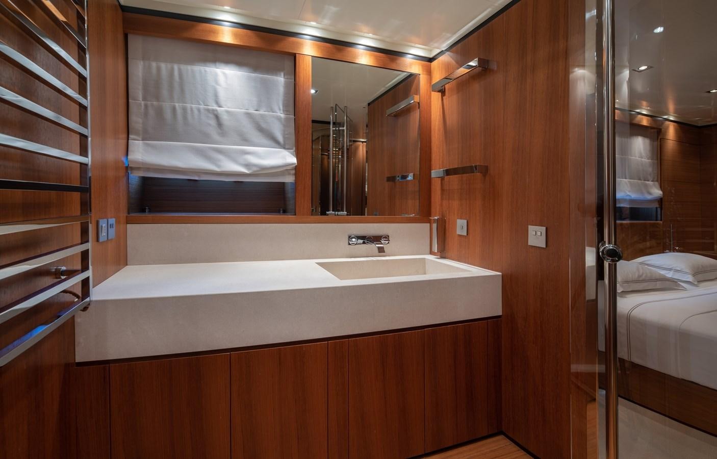 a bathroom with a sink and a mirror aboard TIN TIN Yacht for Sale