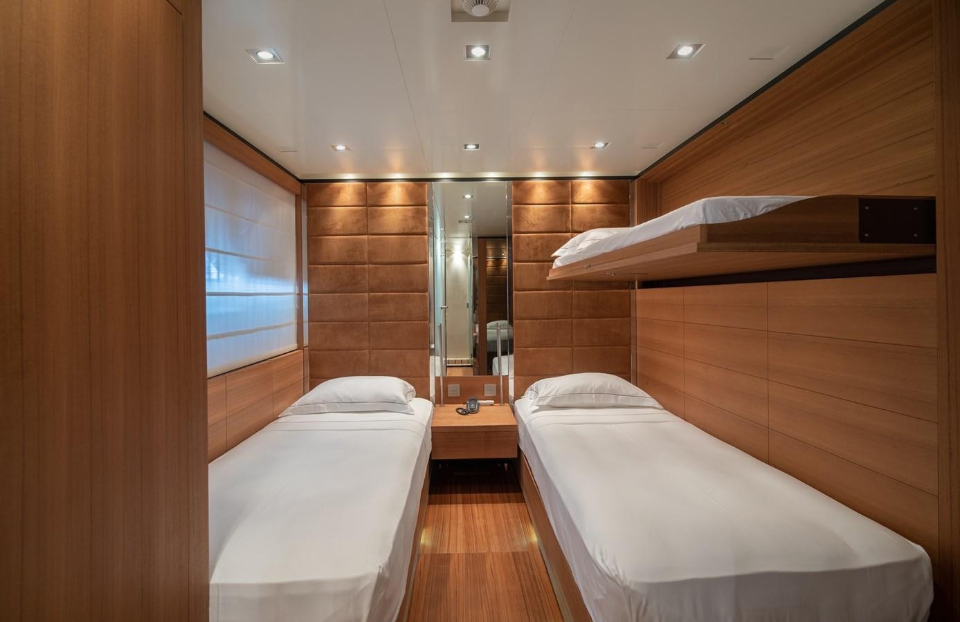 a room with two beds aboard TIN TIN Yacht for Sale