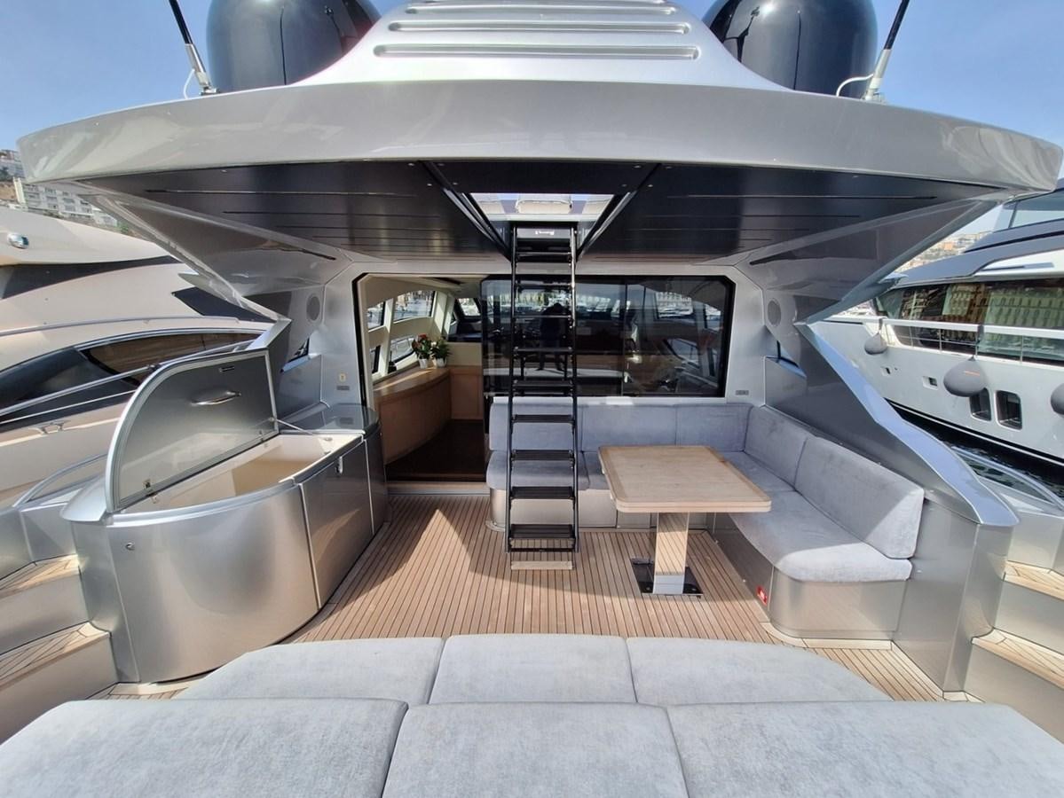 a boat with a deck and a bench aboard MYLO Yacht for Sale