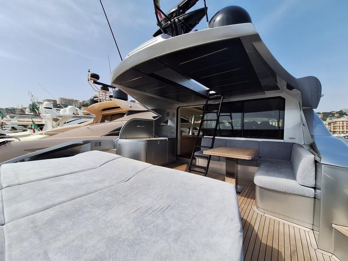 a car with a large grill aboard MYLO Yacht for Sale