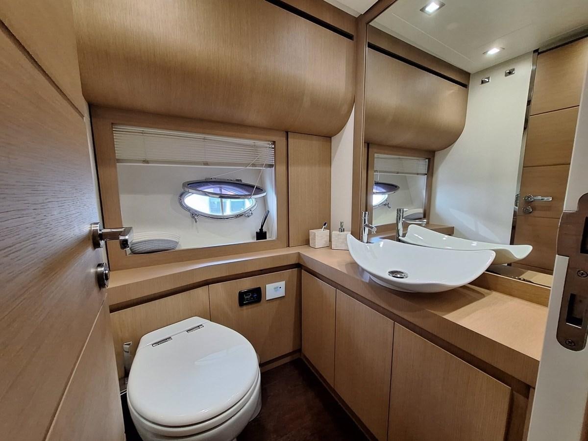 a bathroom with a sink and a toilet aboard MYLO Yacht for Sale