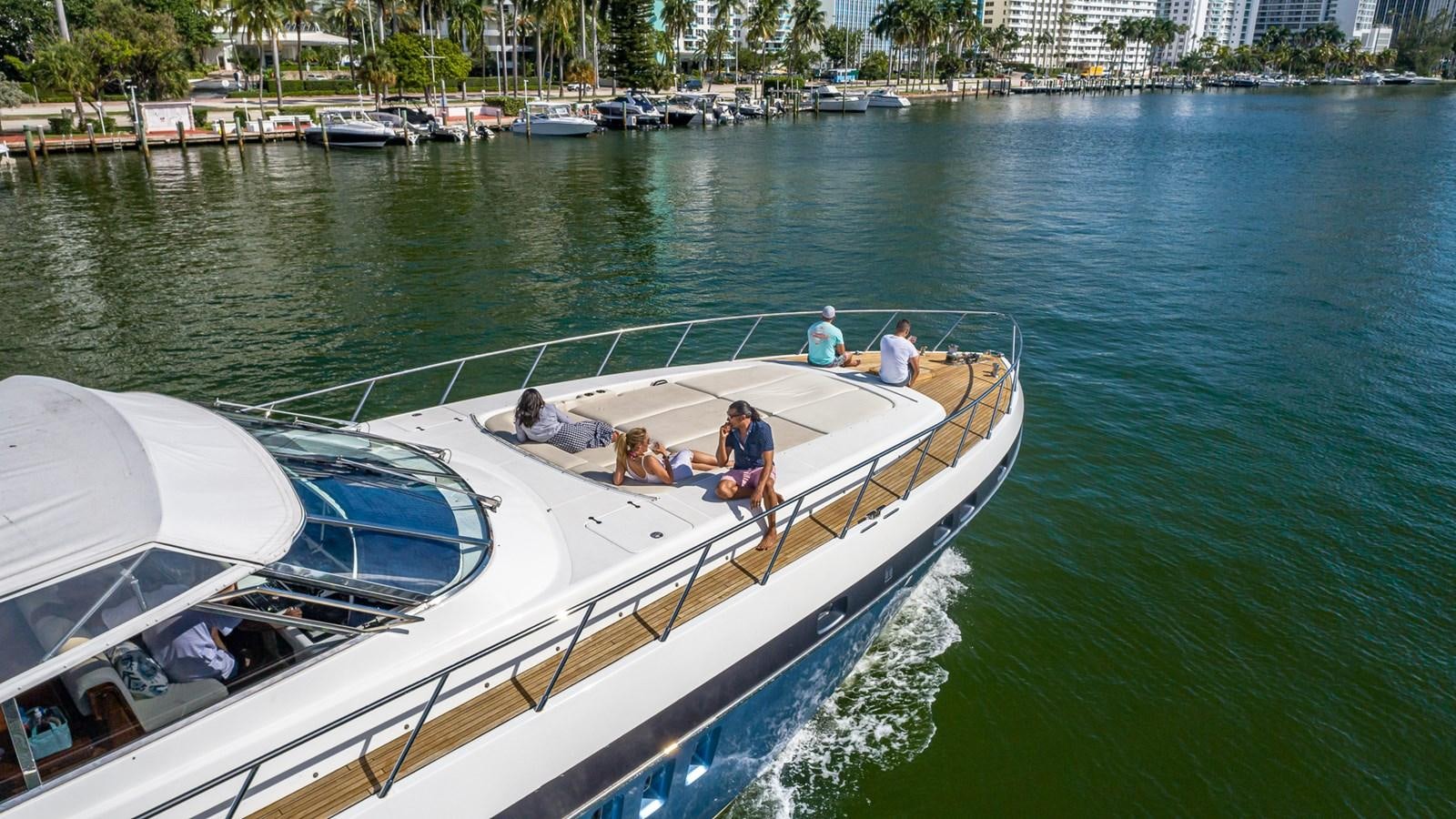 a group of people on a boat aboard HAPPY Yacht for Sale
