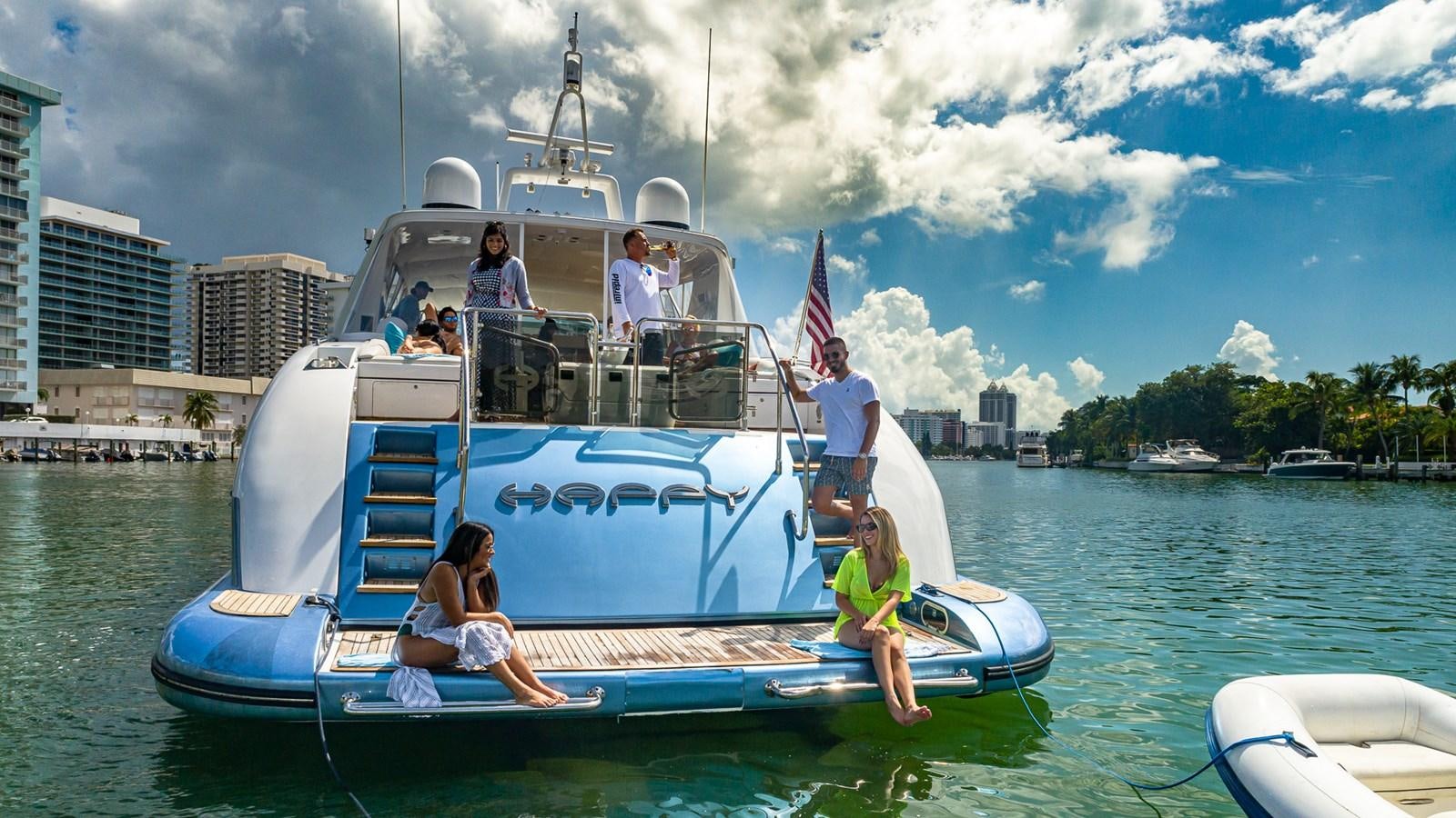 a boat with people on it aboard HAPPY Yacht for Sale