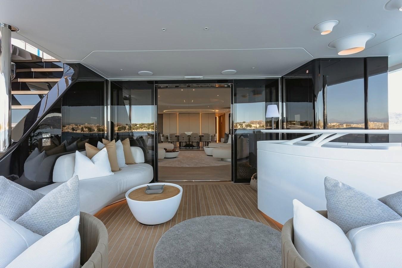 a modern looking living room aboard ADELLA Yacht for Sale