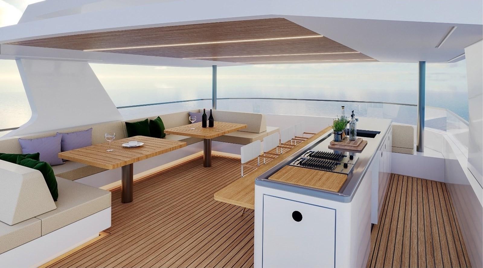 a room with a table and couches aboard AVENTURA 130 Yacht for Sale