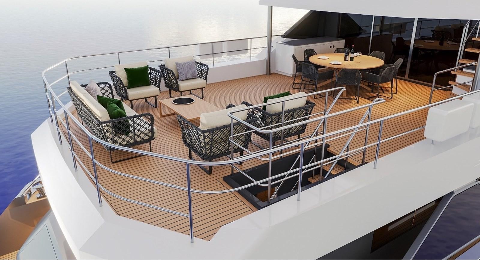 a room with a table chairs and a couch aboard AVENTURA 130 Yacht for Sale