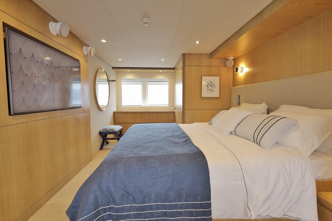 a room with two beds aboard WAIKIKI Yacht for Sale