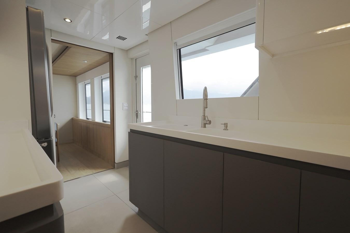 a bathroom with a large countertop aboard WAIKIKI Yacht for Sale