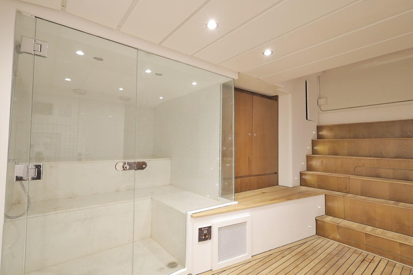 a bathroom with a glass shower aboard WAIKIKI Yacht for Sale