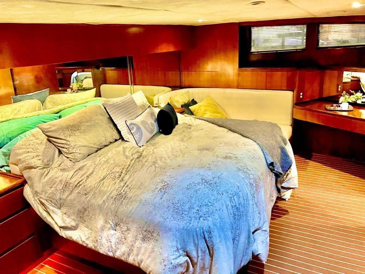 a bed with pillows aboard A NEW BEGINNING Yacht for Sale