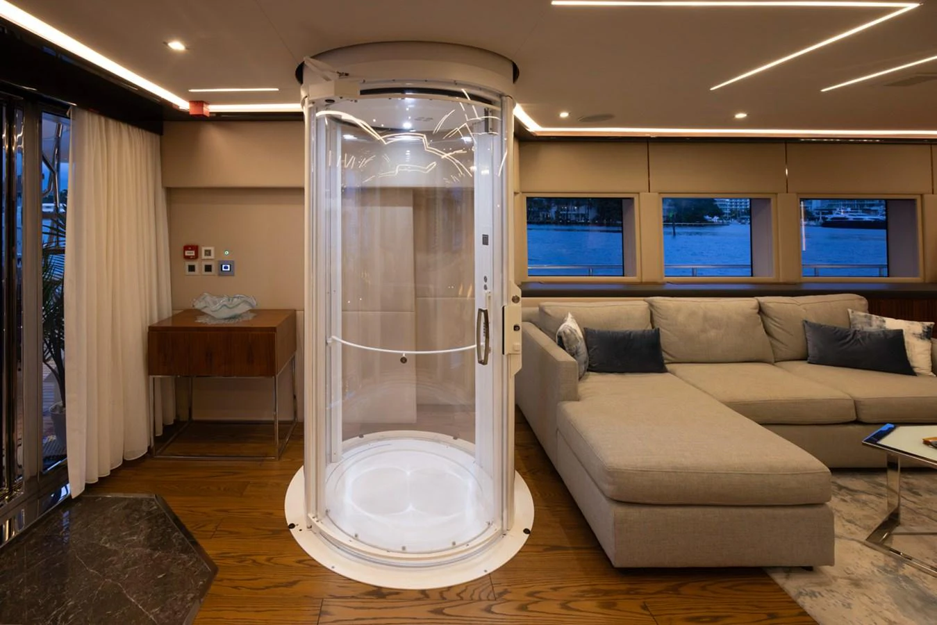 a large glass door in a room aboard KANDO Yacht for Sale