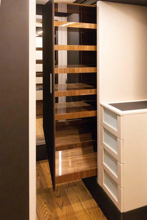 a closet with a shelf aboard KANDO Yacht for Sale