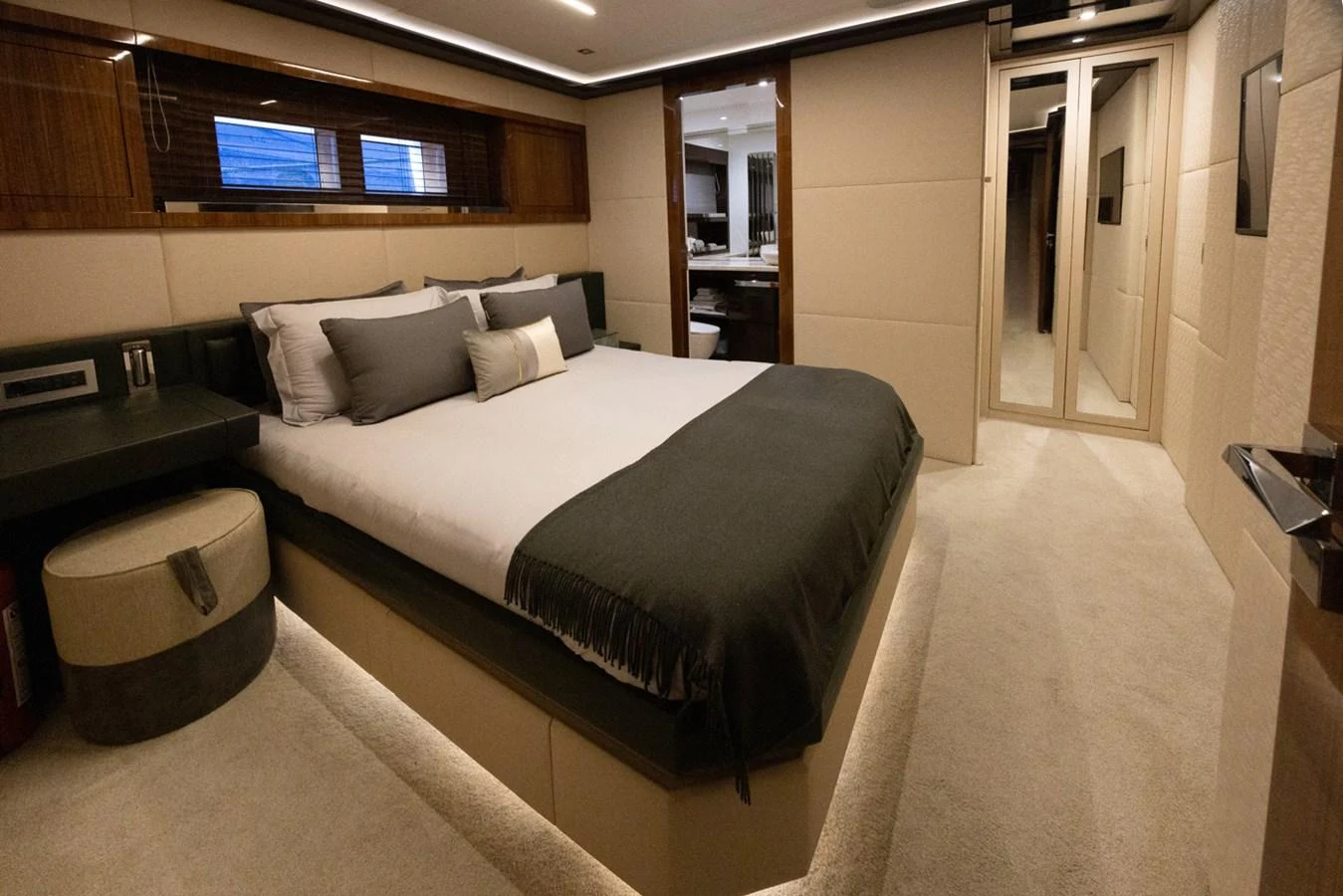 a bed in a room aboard KANDO Yacht for Sale