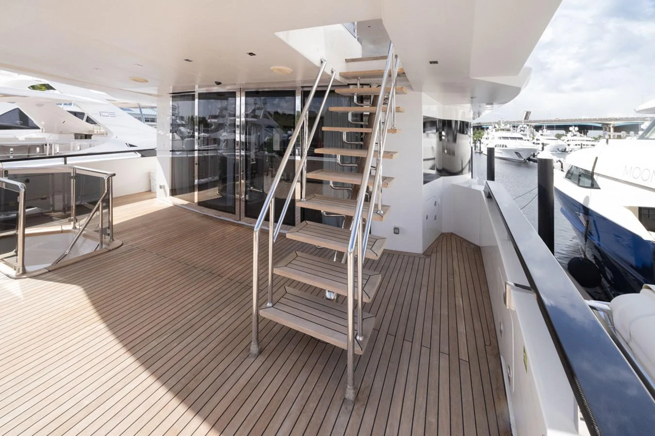 a boat with a staircase aboard KANDO Yacht for Sale
