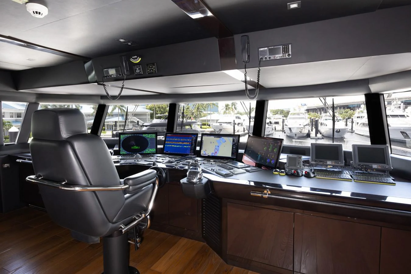 a room with computers and monitors aboard KANDO Yacht for Sale